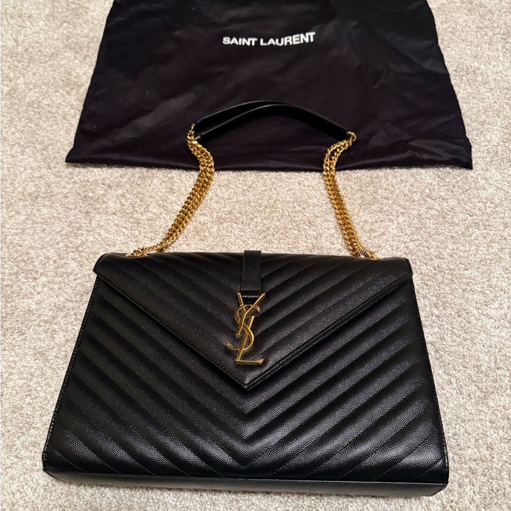 Saint Laurent Black Chevron Bag with Gold Accents